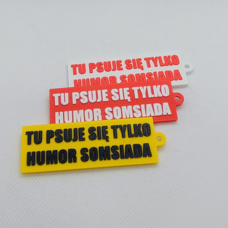 Brelok Rolniczy "TU PSUJE SIĘ TYLKO HUMOR SOMSIADA"